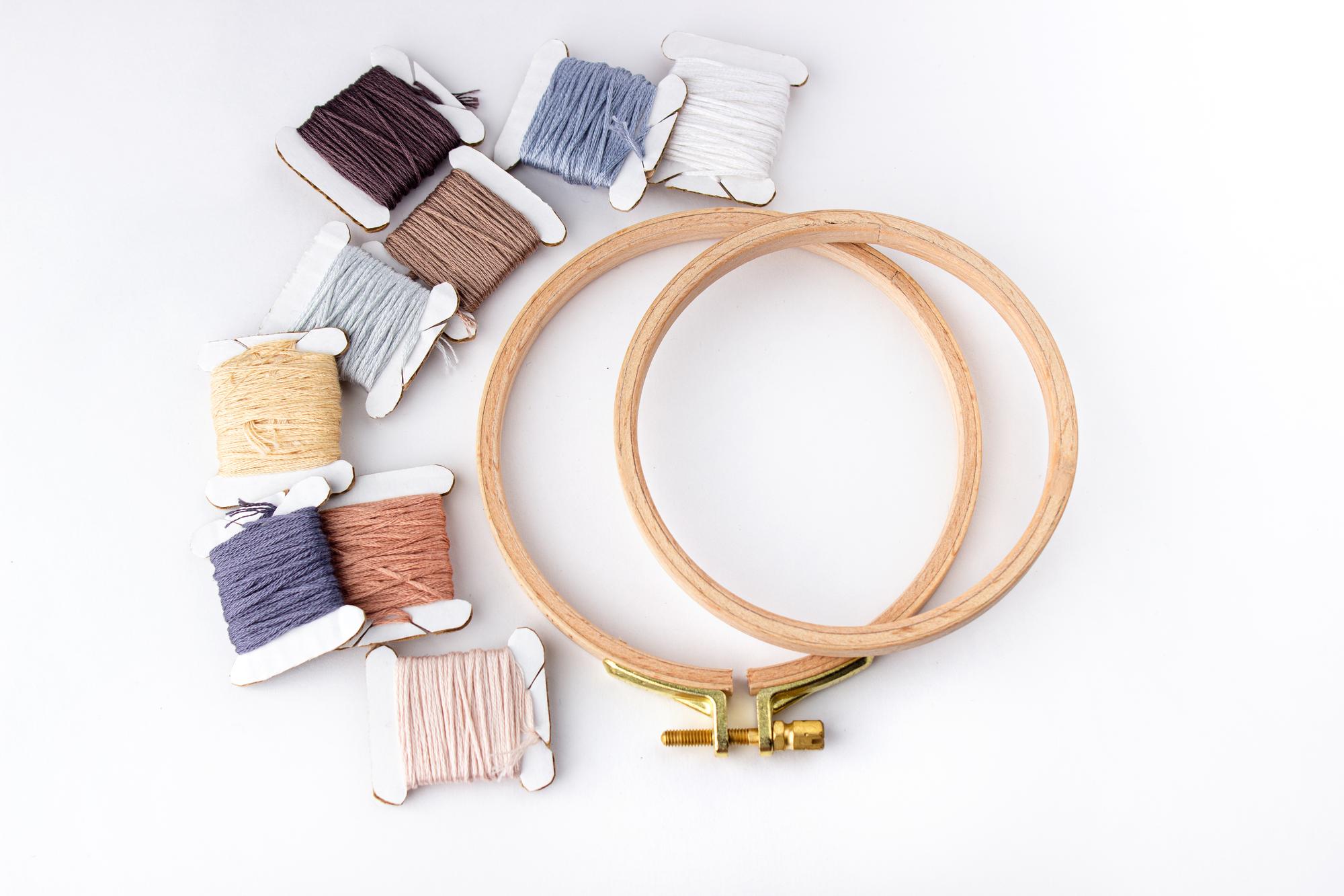 Assorted starter kits with threads and hoop